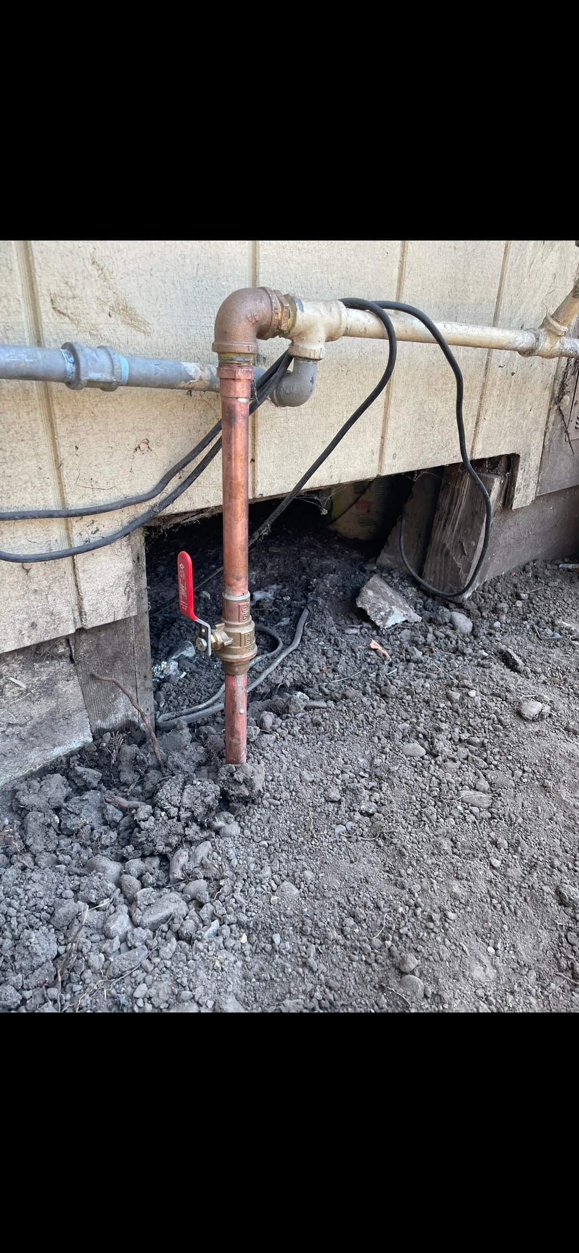 Copper pipe and shutoff valve repair on the exterior of a Santa Rosa home