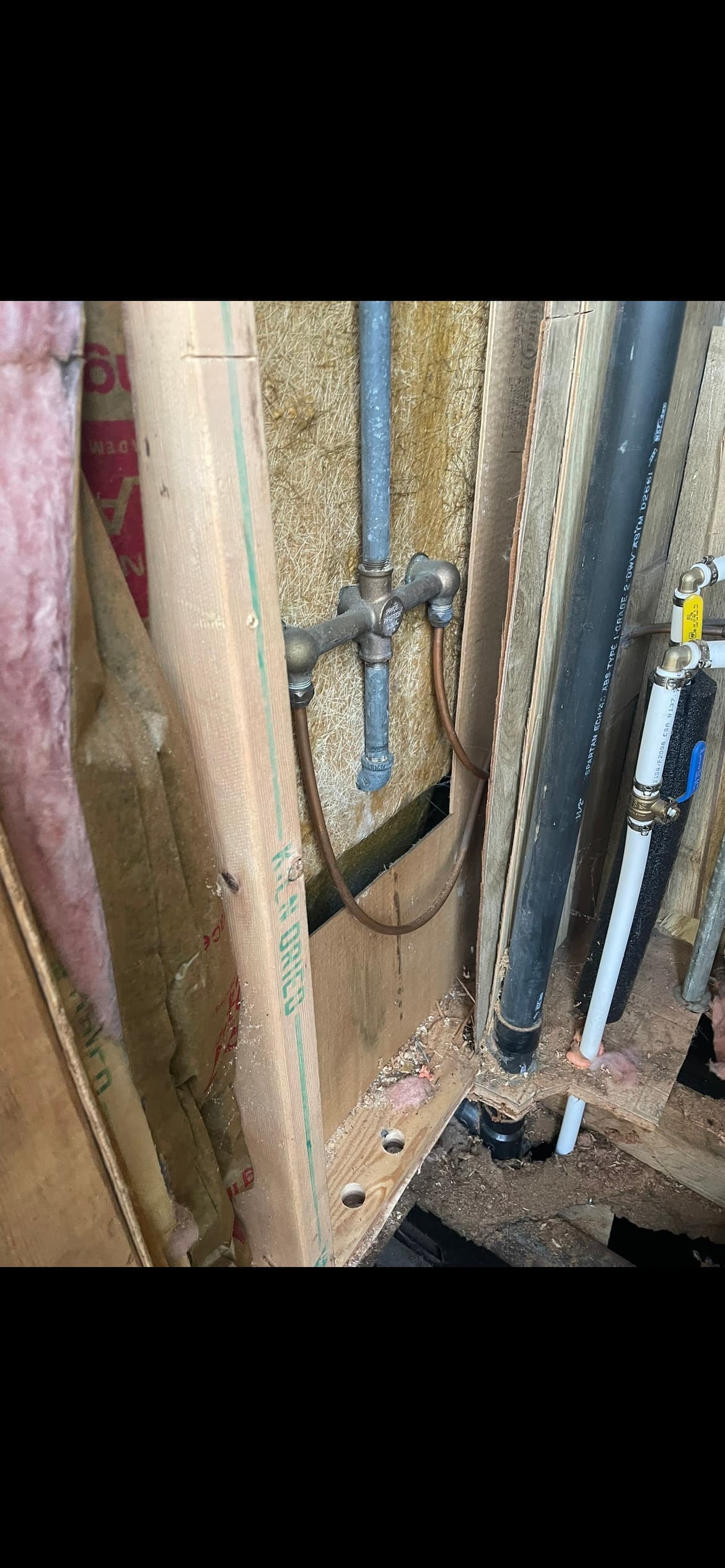Remodel plumbing rough-in inside an open wall during a residential renovation in Santa Rosa